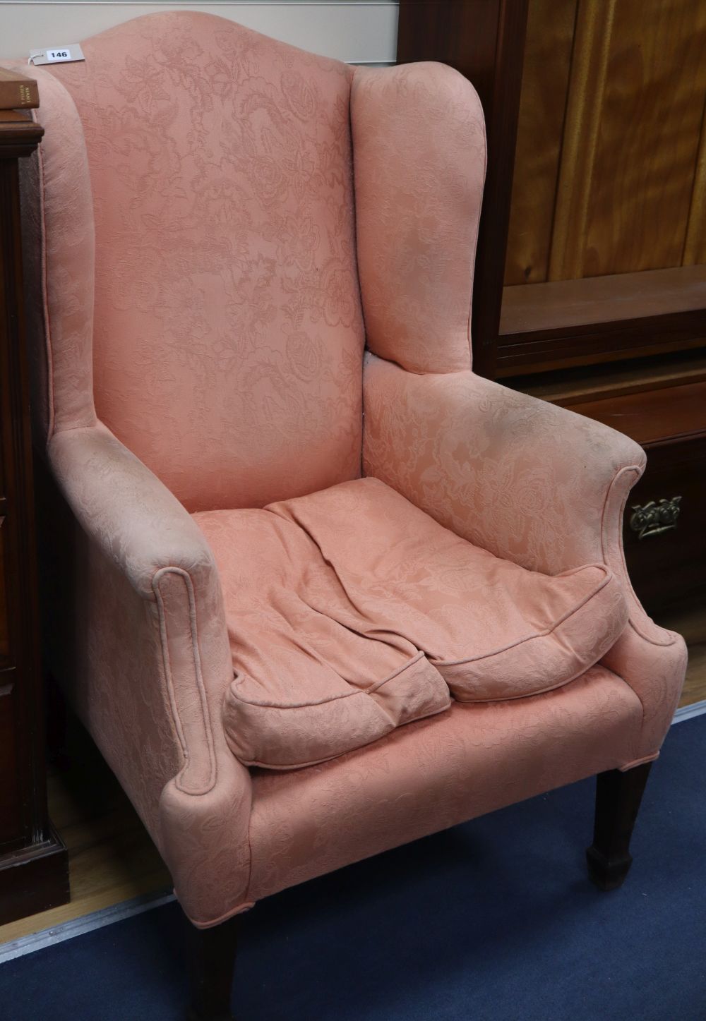 A Georgian style mahogany wing chair